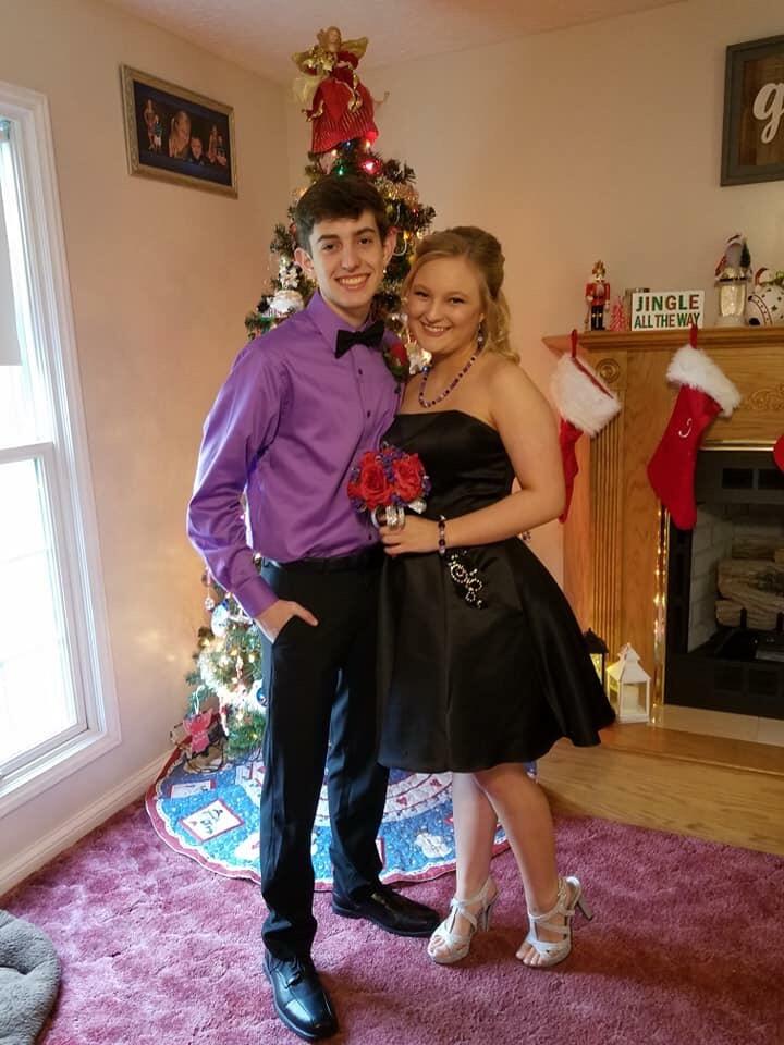 We went to our first high school dance together! Jake didn’t necessarily love the purple shirt, but wore it to make Kaitlyn happy. 