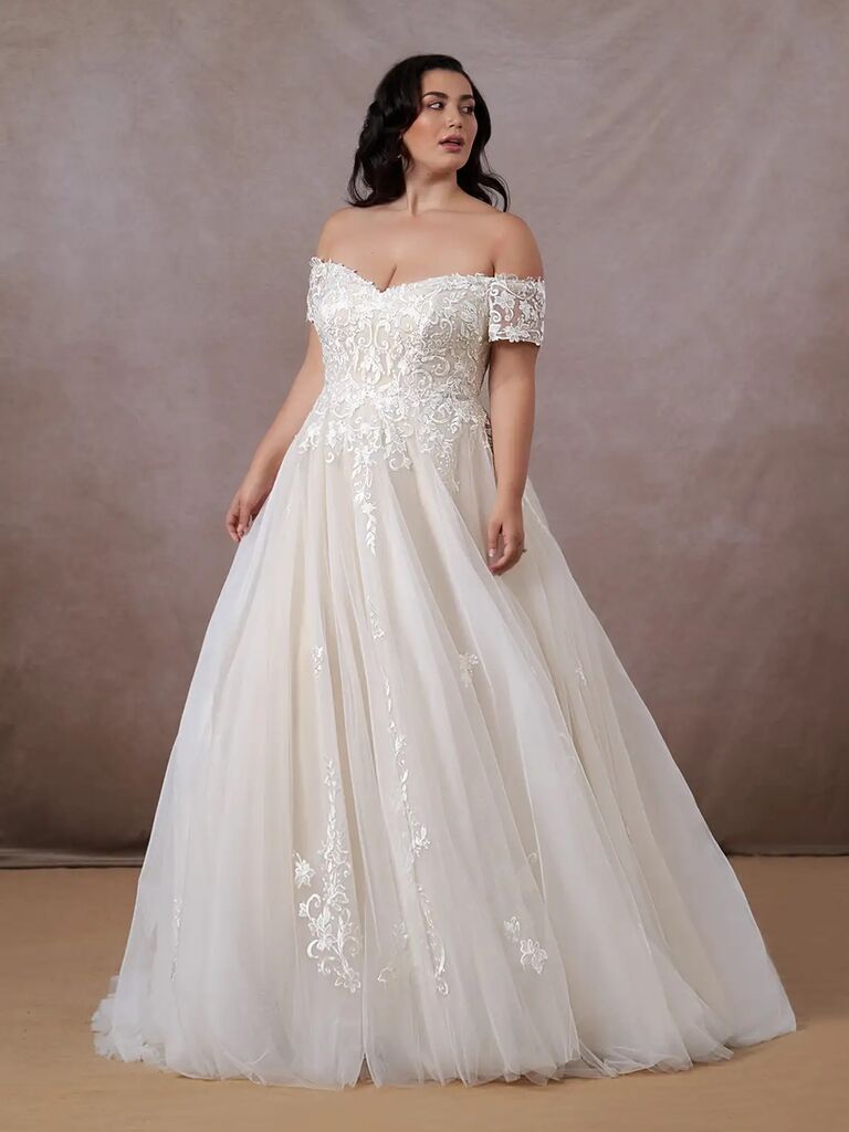 Romantic plus size wedding dress by Azazie. 