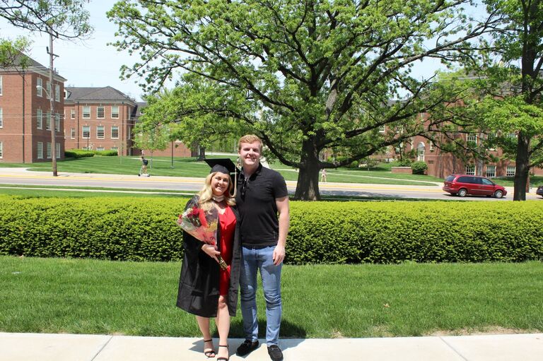 Luke stood by Kelsey's side as she graduated with her Master's Degree!