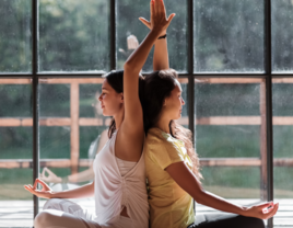 Couple practicing yoga together, couple somatic yoga