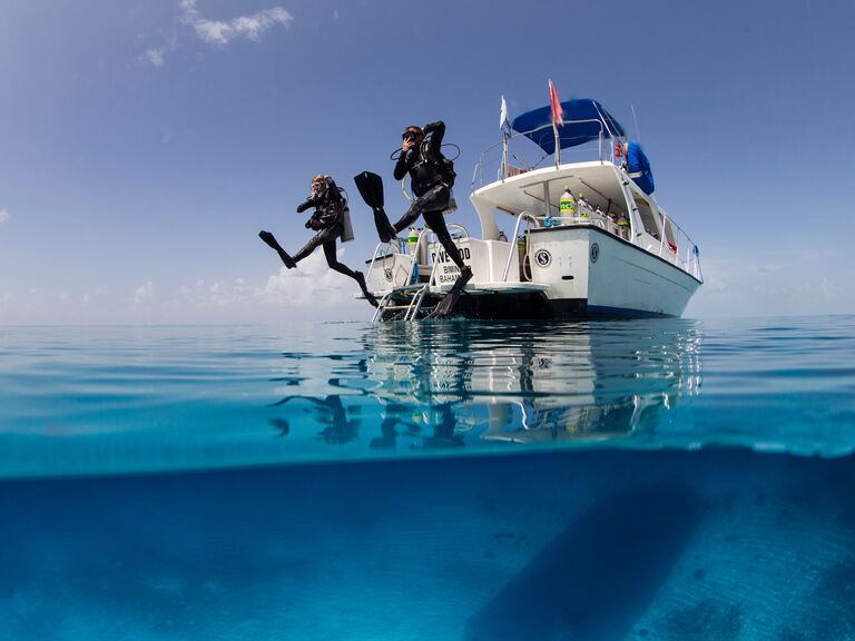 Couple enjoy scuba diving in Bahamas