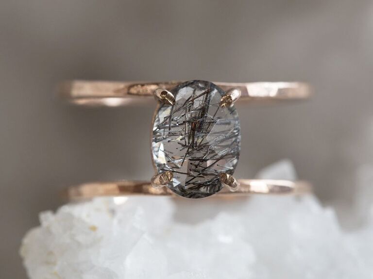 tourmalinated quartz engagement ring in caged band