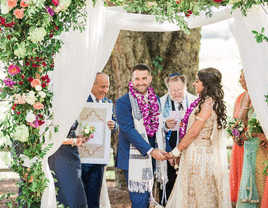 Jewish and Hindu mixed faith wedding ceremony.