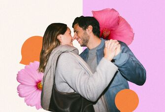 Young couple dancing and leaning in for a kiss surrounded by flowers