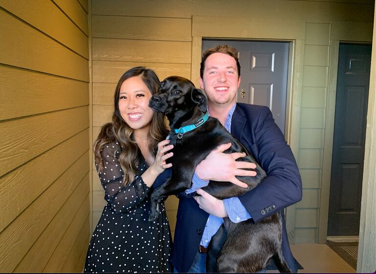 *This photo was taken on their 4 year anniversary, right in front of their first apartment together*

Grant and Emma moved to Houston! They juggled night shift, being new puppy parents, Emma going back to school to become a nurse practitioner, and all the joys of newly living together for two whole years. During this time, Emma and Grant weighed the possibility of getting engaged and being together forever.  