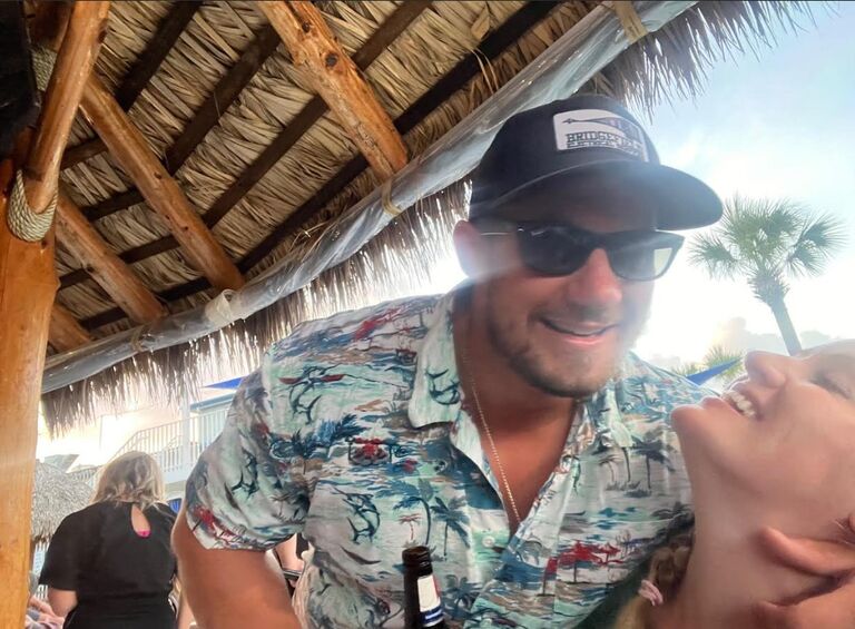 This photo was taken at the Wheelhouse - The Tiki bar where Luke and Kelly met for the first time!