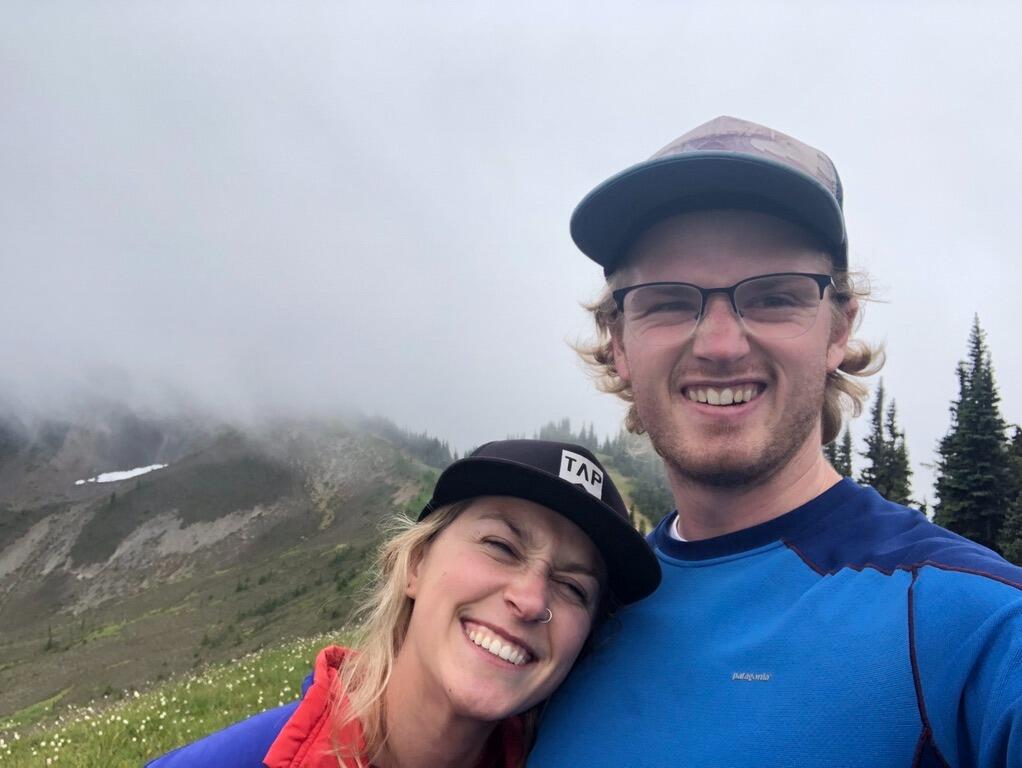 In May of 2019, Hannah quit her job and moved up to Bozeman to move in with Sam.  Two weeks after she moved up there, he left her!!!! And was sent to live in Bellingham, WA, by his job. This is a photo from hiking in Bellingham - just imagine Mt. Rainier behind them in the fog.