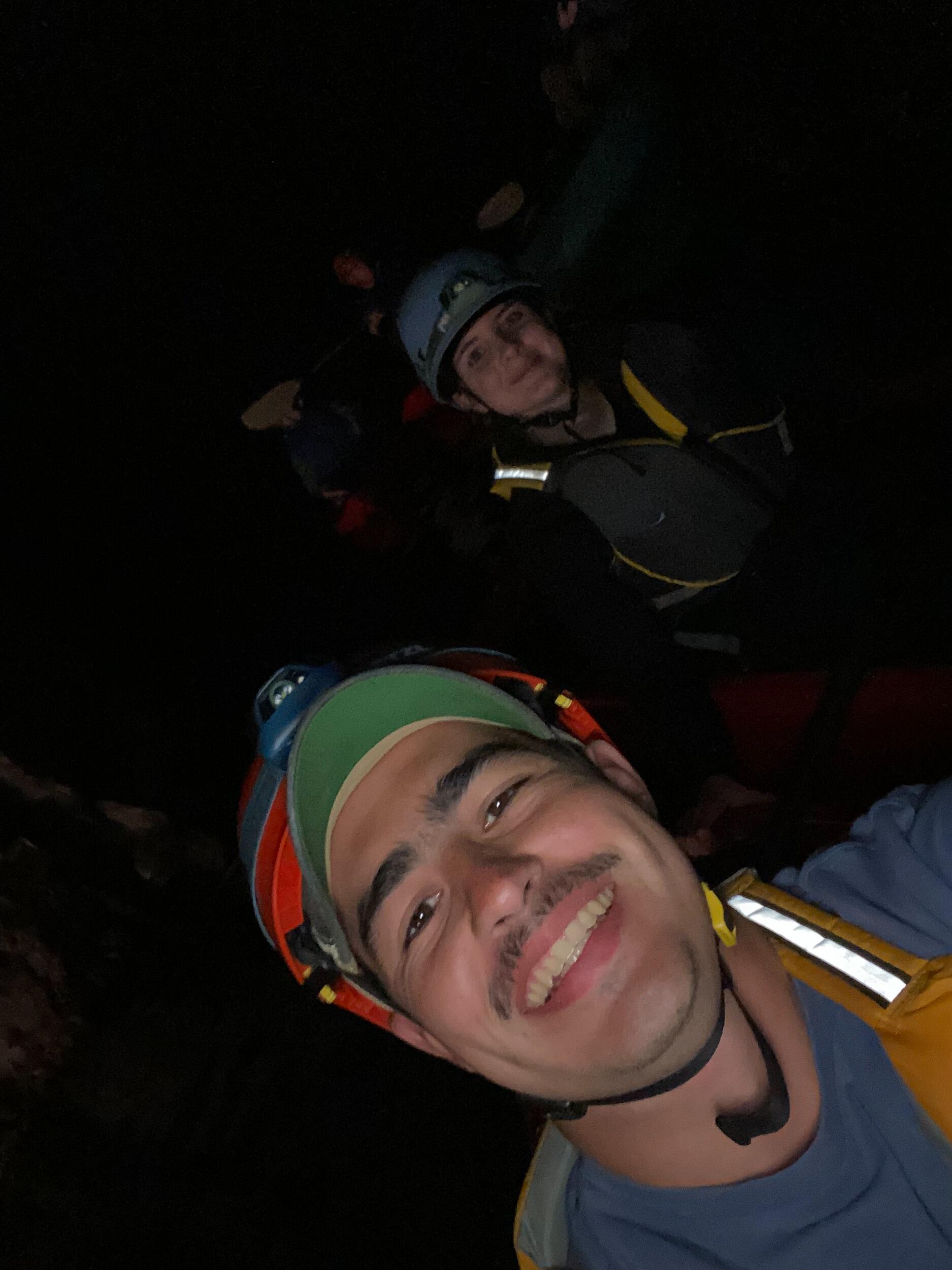 Andrew and Elizabeth kayaking in an underwater cave in Kentucky 