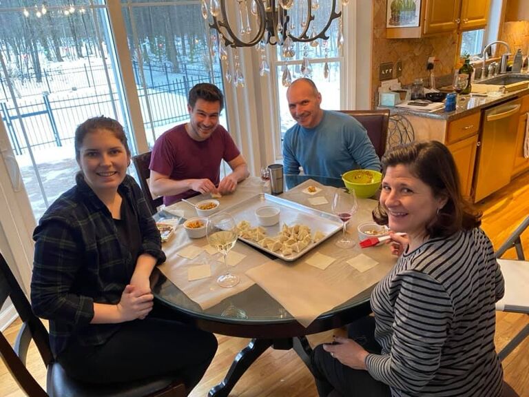 Family making dumplings for the Superbowl!