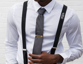 Black tuxedo suspenders with white monogram