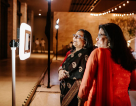 Wedding guests recording video for video guest book