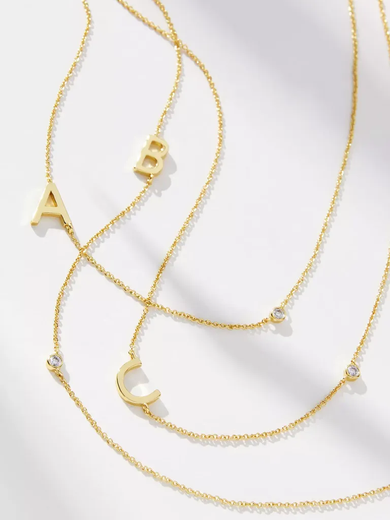 Uncommon James gold initial necklace maid of honor gift from Anthopologie