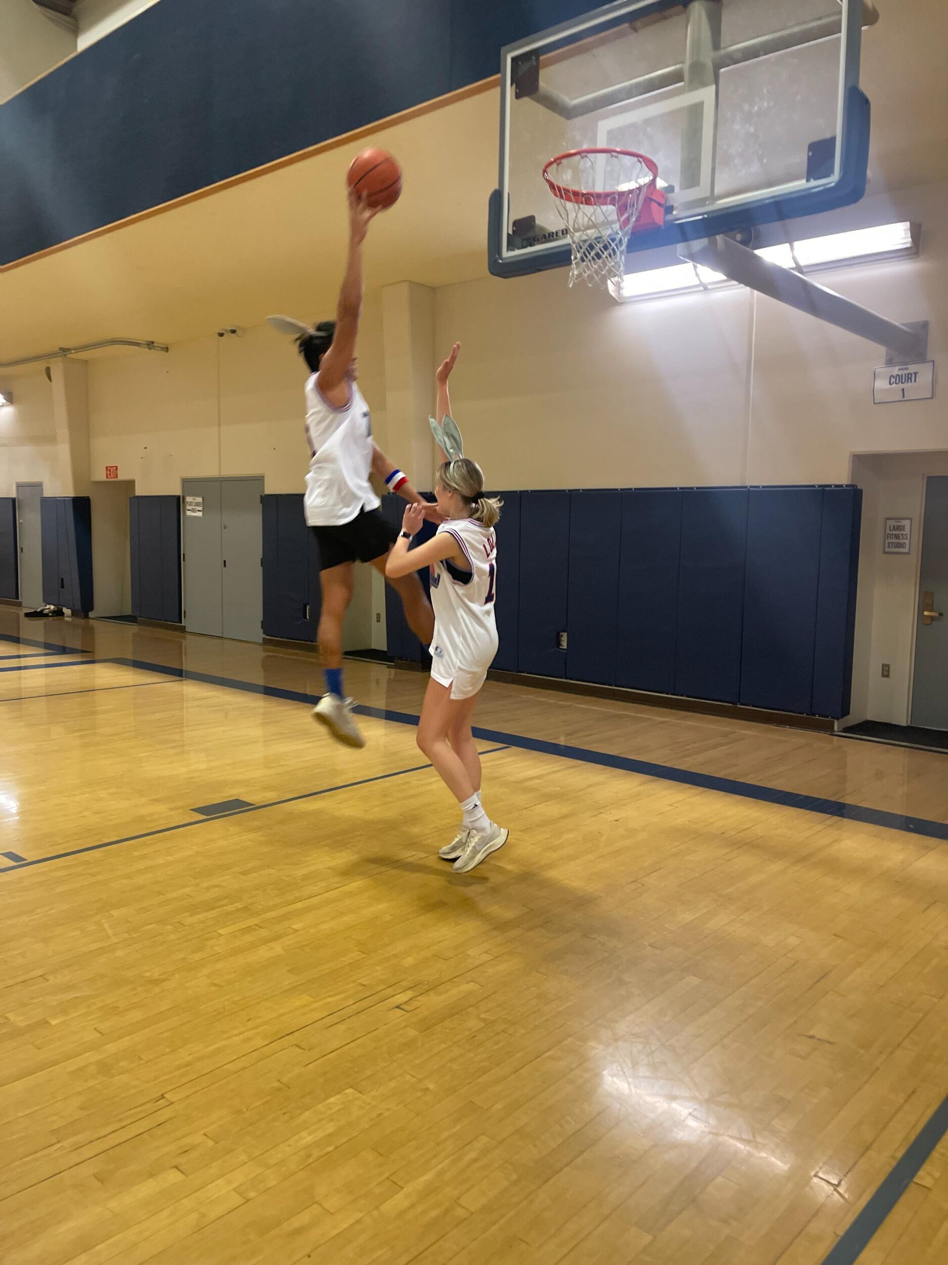 Our second Halloween costume together (did he make the shot or not?)