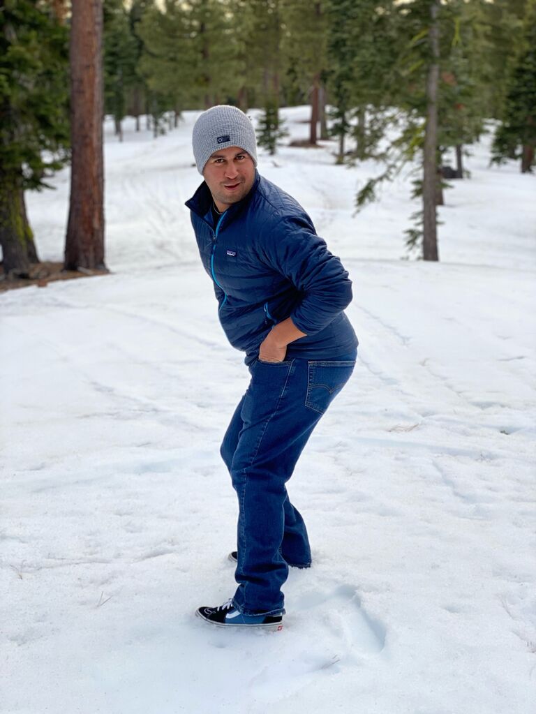 Andrew went on a snowboarding trip to Tahoe and sent pictures to lure Julie in with his ... charm.