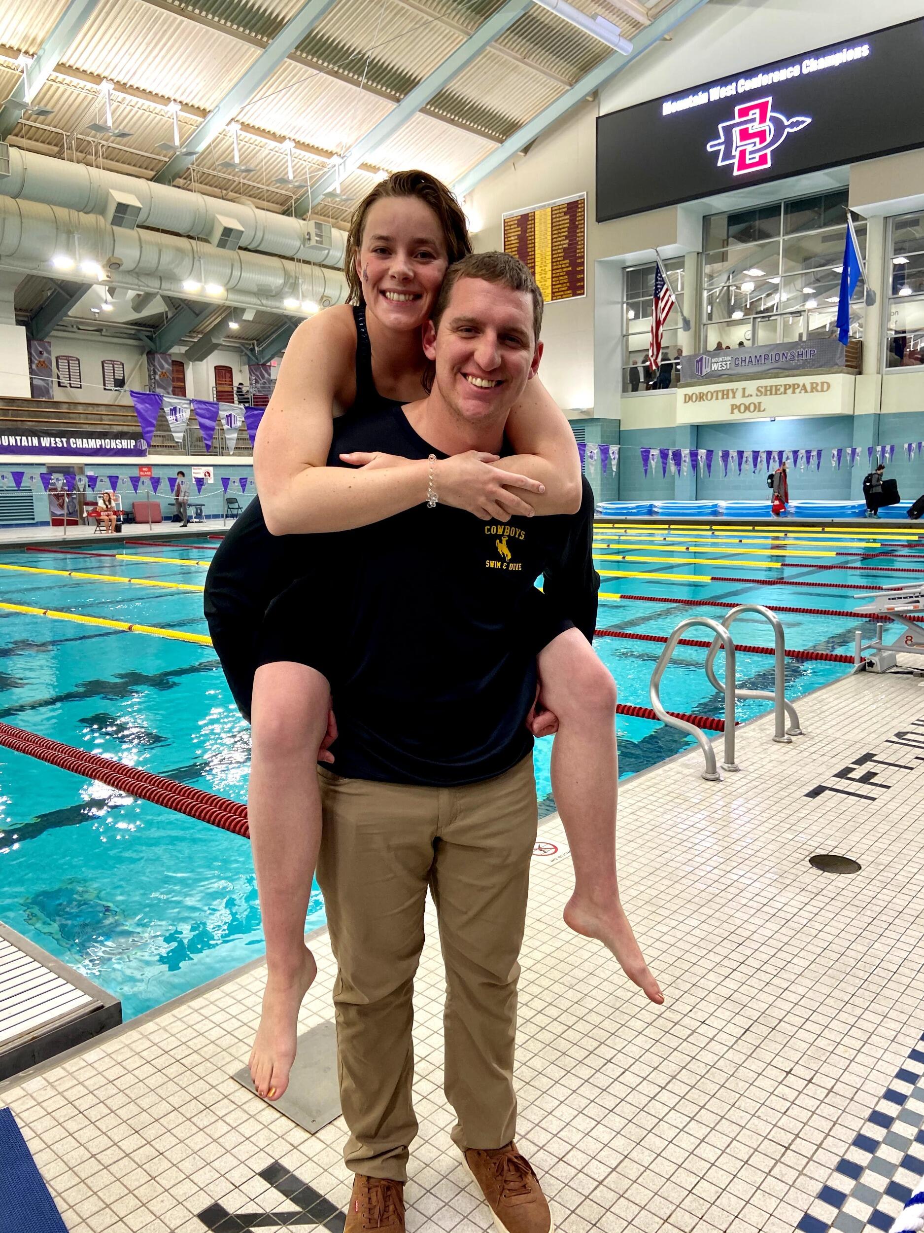 Kyle supporting Kiana at her final collegiate meet, the Mountain West Championships in Minnesota.