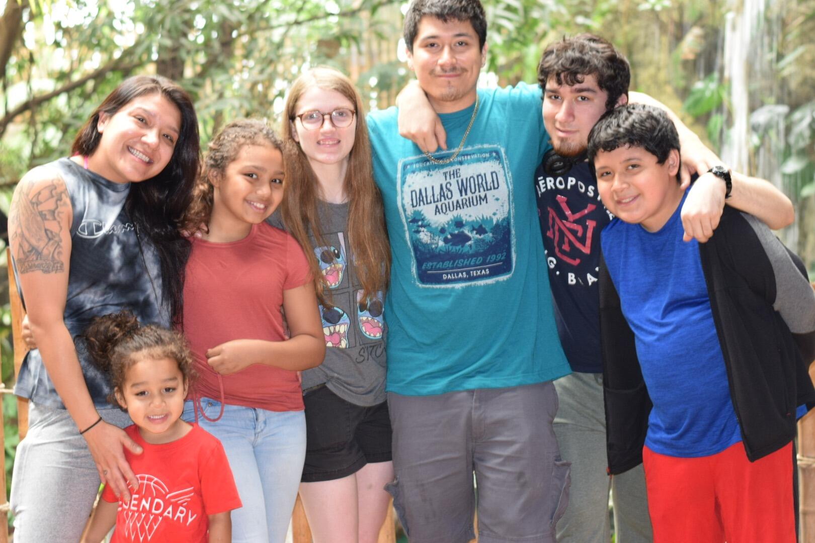 This picture was taken at the Dallas aquarium with Octavio's family. 
