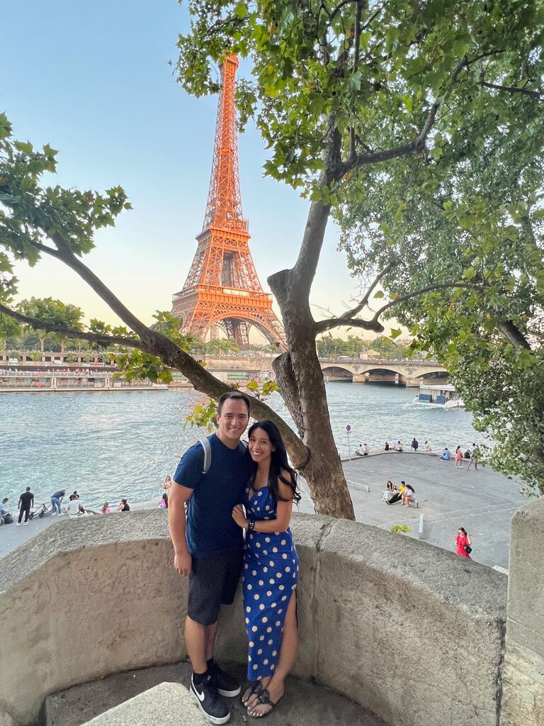 Paris, by the Eiffel Tower. **chef's kiss**