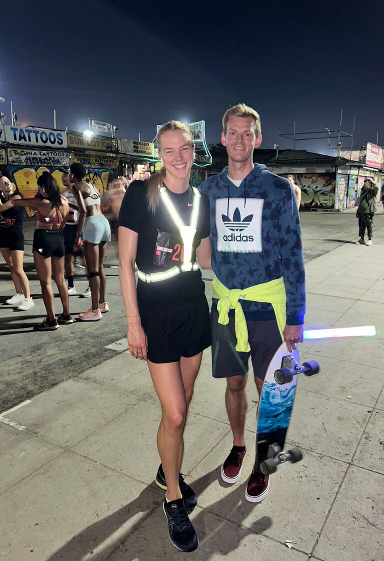 Hannah runs her first 5K! Reuben is there to support, as always!
