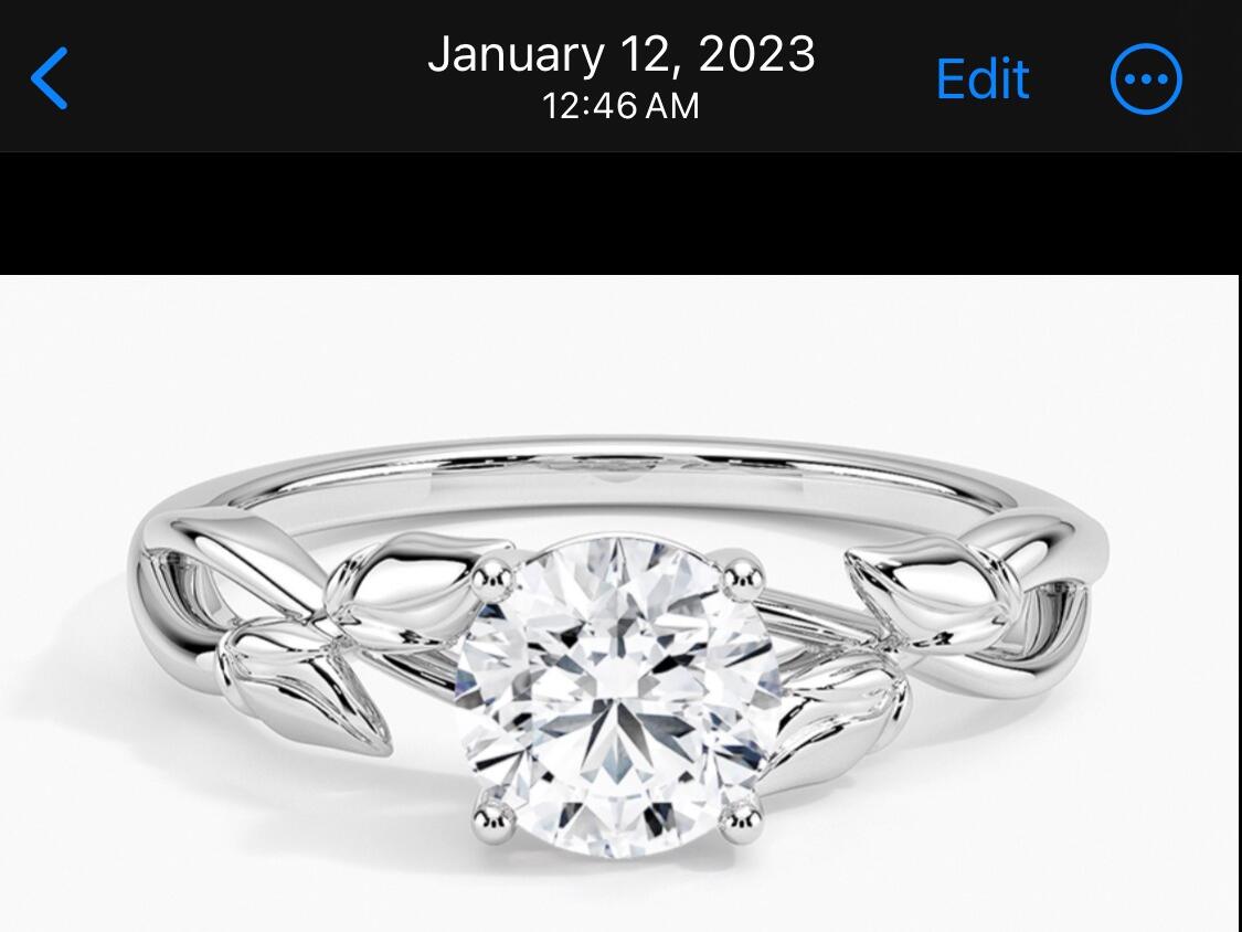 The engagement ring we picked out one week after we started dating.

...and, yes! It's the ring Nate proposed with and Amanda proudly wears every day.