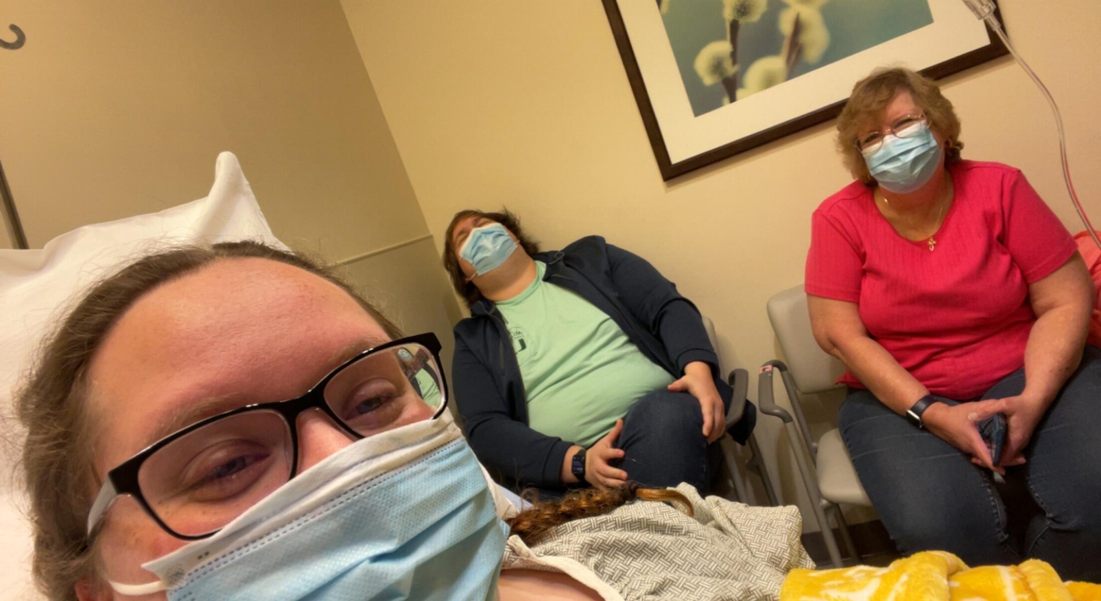 Sarah getting some company from Brett and Laura before her ACL surgery.