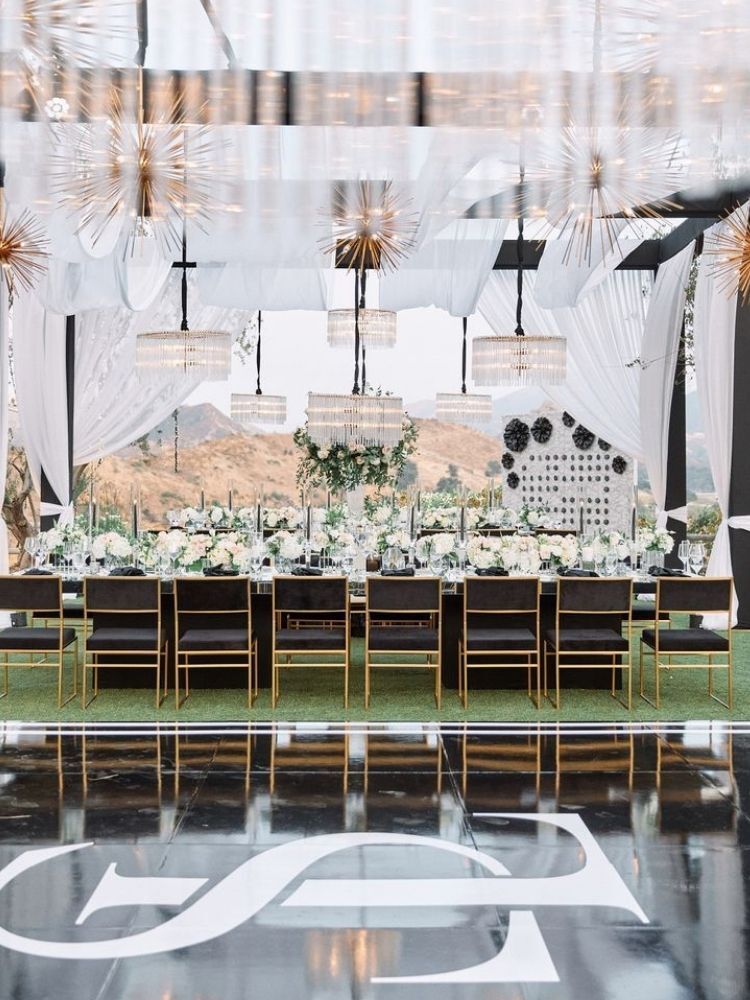 glam wedding reception with custom black-and-white dance floor wrap