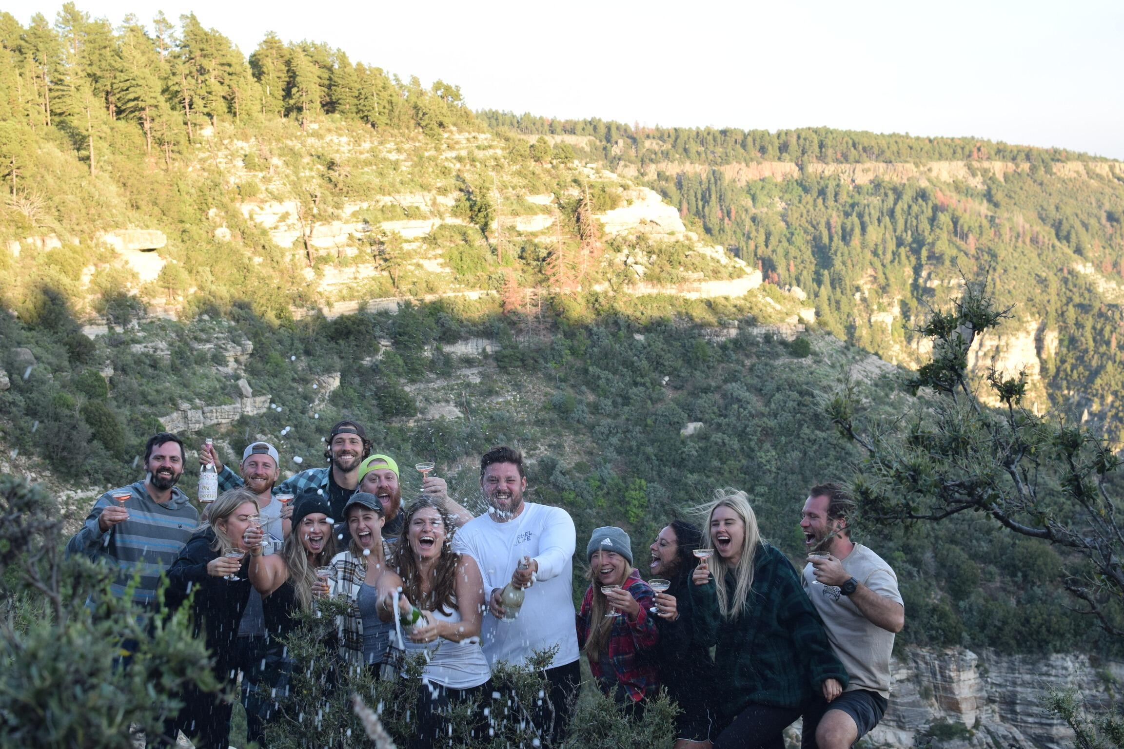 And it happened!!!! Dan took her back to the same spot as their first adventure and popped the question along with several bottles. They can't wait to share their special day with all of you! 