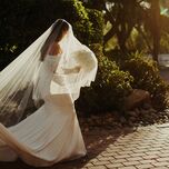 Bride wearing long veil