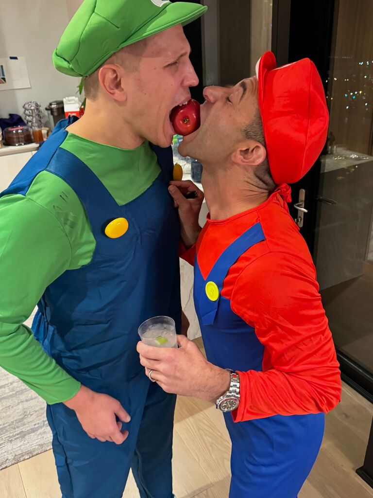 Being silly at a Halloween Party they hosted...John was Mario beucase Mario is shorter :)