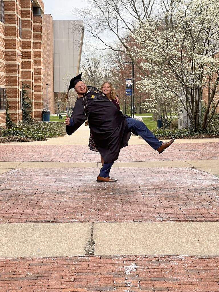 Alexis and Michael had to recreate the picture from her graduation. This my friends is why the guy is in charge of doing the dipping. 