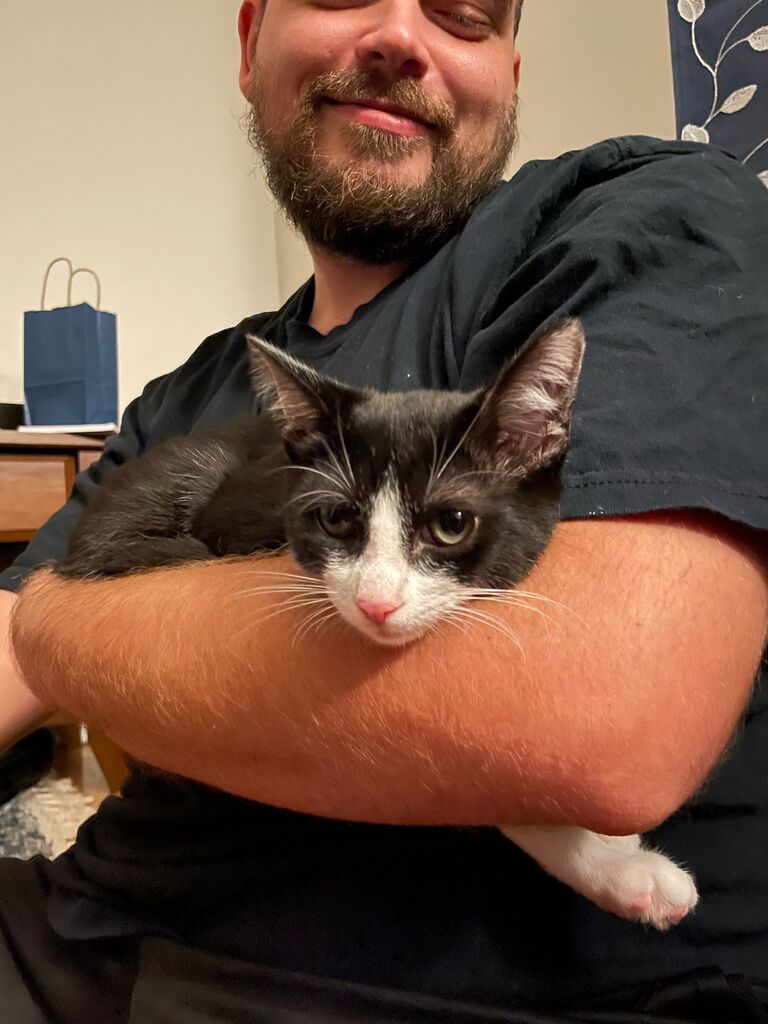 We moved in together July 2021, but quickly realized the home felt empty without our family pets. Adopting Newton was one of the best decisions we made together, and it's been so wonderful seeing our family grow over the years. 