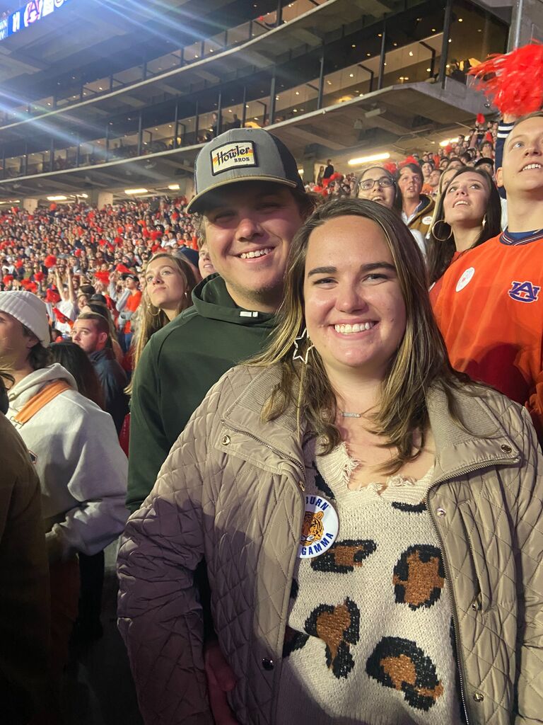 Trey Surprises Colby at the Auburn-Ole Miss football game.