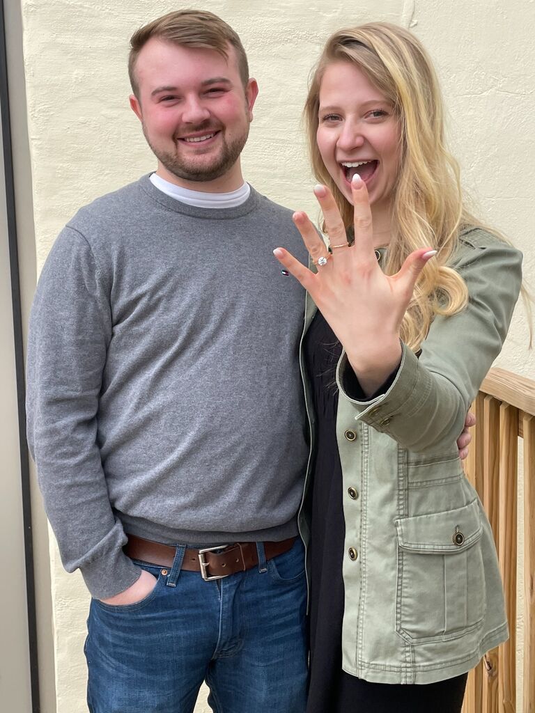 We are engaged! This picture was taken moments after EJ got down on one knee, and our faces say it all! Many tears of joy were shed by us both! After months of EJ dropping hints and countless conversations about our future together, the  moment finally came when both of us get to  officially begin preparing for our forever. EJ proposed after the Good Friday Mass  in the side chapel that held all of the Easter Vigil flowers at Marcy's home parish, St. Mary's Church. The day in which EJ decided to pop the question may be a surprise to most. Good Friday is a day of mourning because Christ made the ultimate sacrifice on the cross by giving up His life for the salvation of the world. Although the suffering that Christ endured on the cross for our sins does make this day solemn, Good Friday is actually the climax of the greatest love story this world has ever known. Christ laid down His life for His Bride, the Church! In a marriage, we are called to love just as Christ did. In St. Paul's letter to the Ephesians, he instructs husbands to "love your wives, just as Christ loved the church and gave himself up for her." Knowing this truth, EJ could not think of a better day than to ask Marcy to be his wife as he promises to strive to love her just as big as Christ loves us.