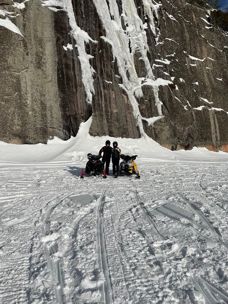 Snowmobiling through Voyageurs National Park