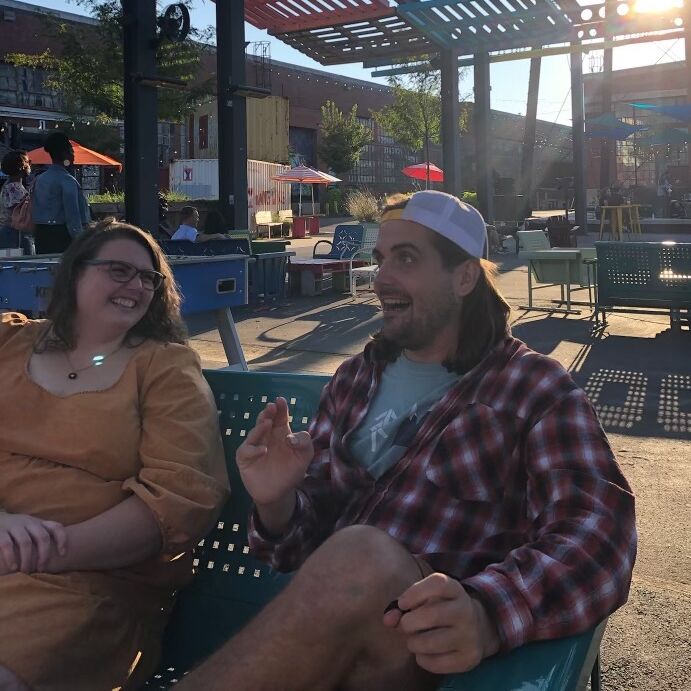 Our second date, and the first photo of Jen & Austin together. Jen invited Austin to a concert with her and her sibling Corrie. This photo was taken sneakily without Austin noticing and it's remained a favorite photo of us. 