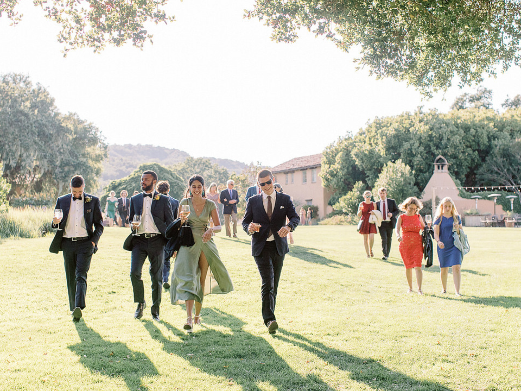 Guests at formal summer wedding