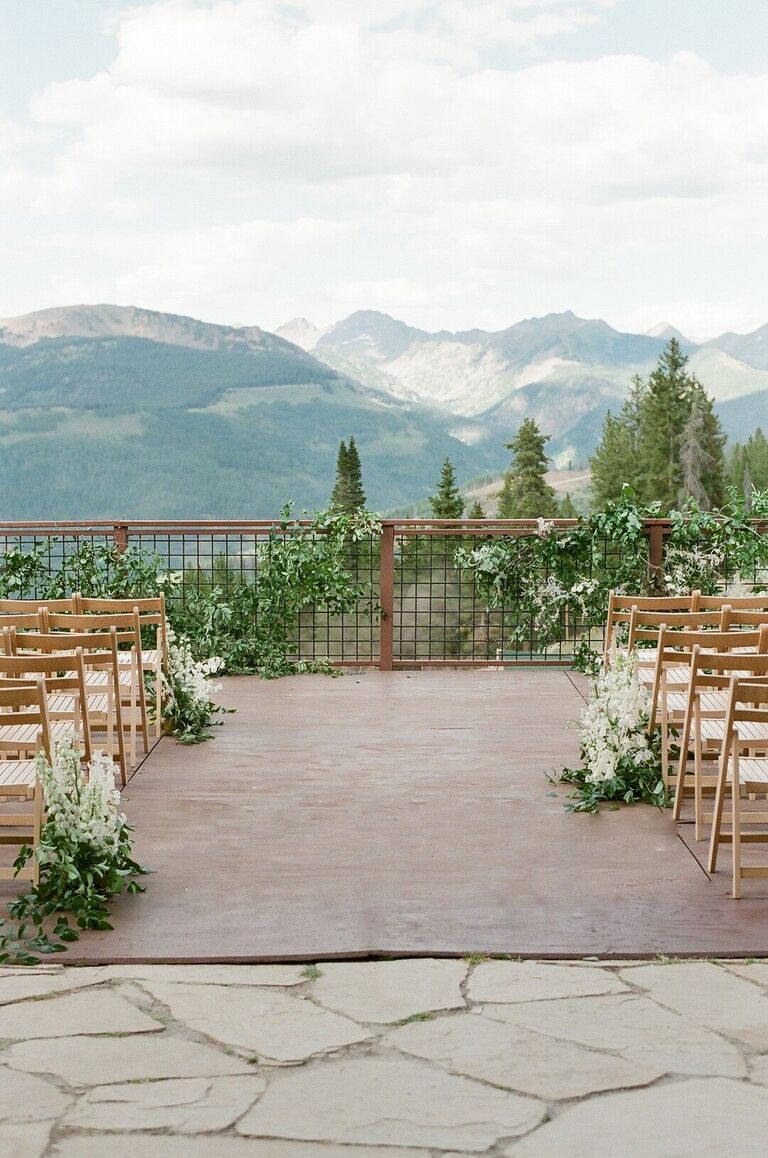 Terrace wedding ceremony with mountain views