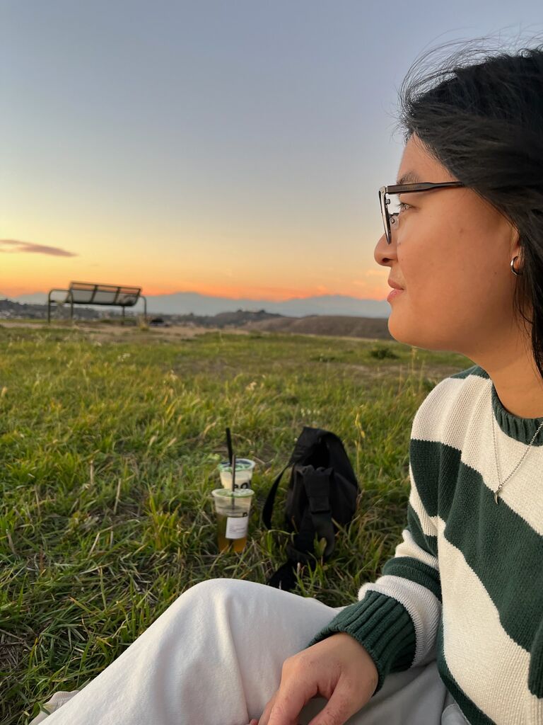 We keep sitting on a hill for our first date.