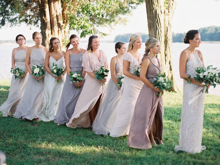 Bridesmaids watching vows during wedding ceremony