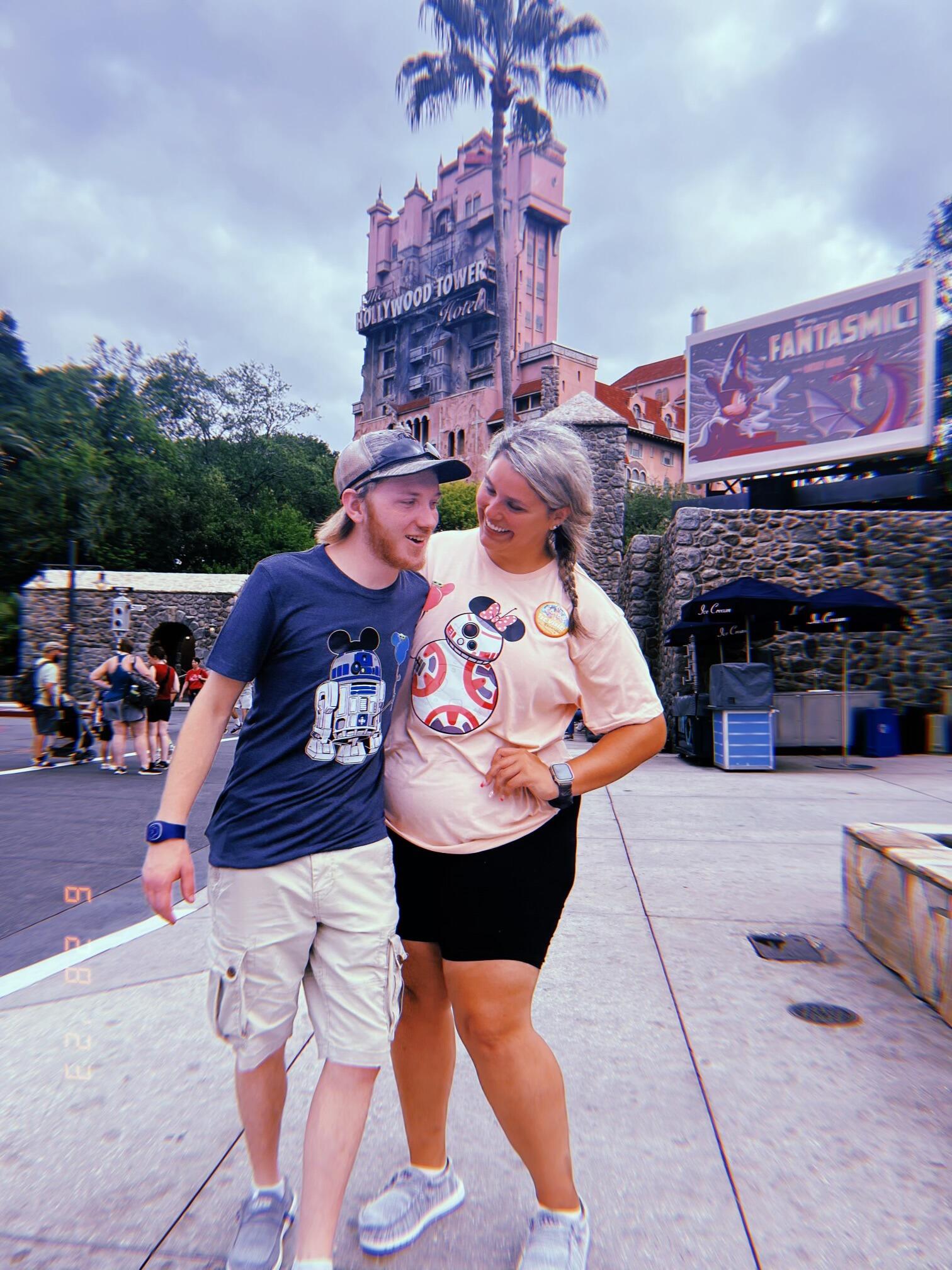 Right before William convinced Izabella to go on the Tower of Terror at Disney World (the ride behind us). Izabella's first time to Disney world.