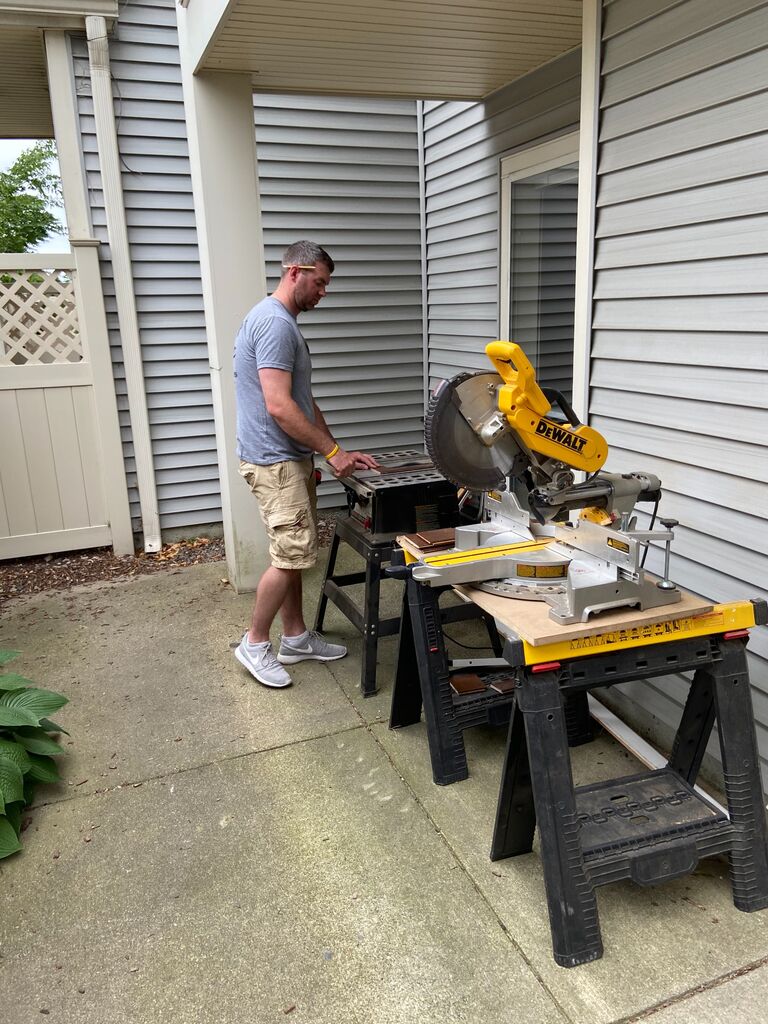 Conor got to work on the Quincy condo putting in new flooring. Little did he know the home improvement plans down the road!