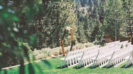 Rustic wedding at fishing lodge. Display of fishing pictures from both  sides of fa…