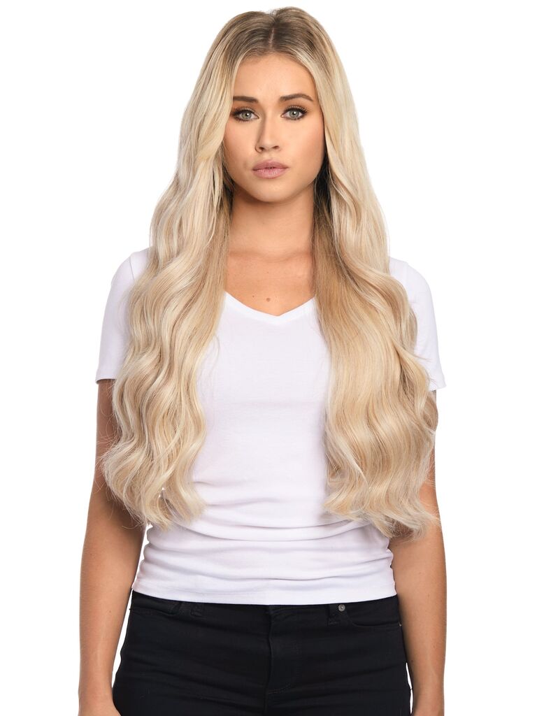 Long blonde silk seam hair extensions. 