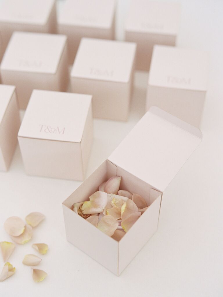 spring wedding favor small blush pink paper boxes filled with pink rose petals
