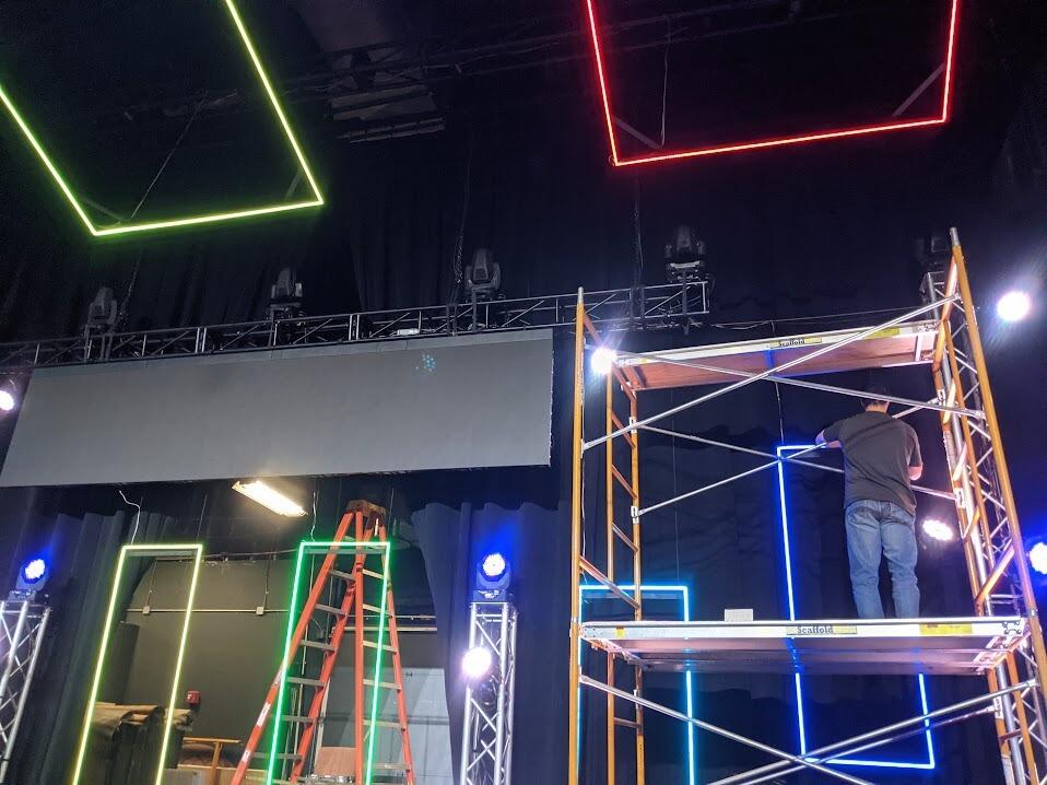 Laura and Mike install the light frames in the new set build for church.  They were at 'hanging out' stage at this point, and it was a fun non-date.