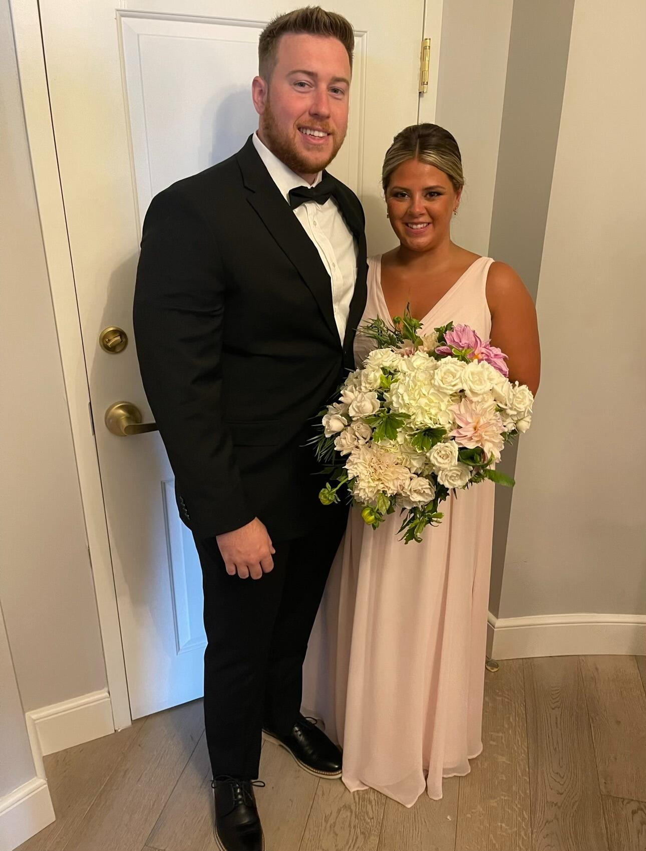 The Bride and Groom celebrate their brother's wedding