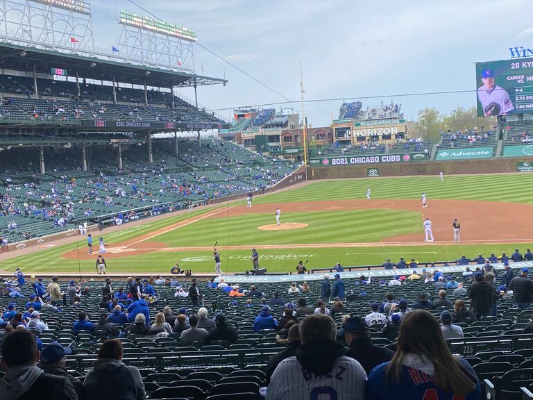Olivias first Cubs game, and her first time at Wrigley Field. One of Kyles favorite places. About 4 years 4 months. 