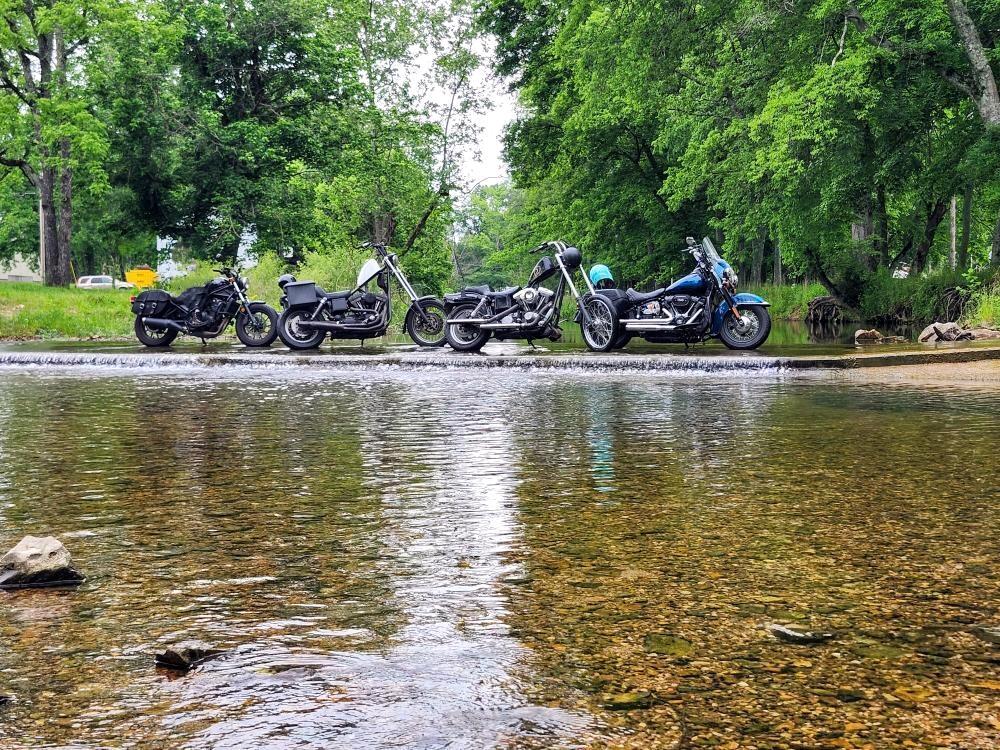 The water covered bridges and their bikes that first ride. 
