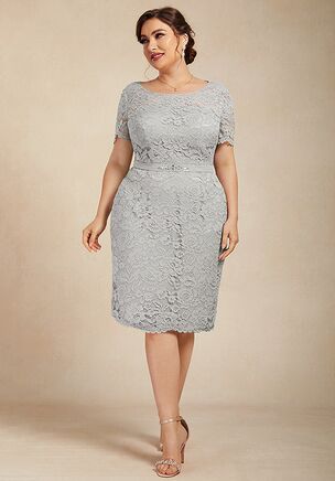 Lace and chiffon combine to create this elegant two-piece set, giving it a classy and sophisticated look. It features a lace bodice and scoop neckline with a flattering sheath skirt. The dress features a stylish wrap with three-quarter sleeves, perfect for cooler evenings. A timeless piece for any special occasion.