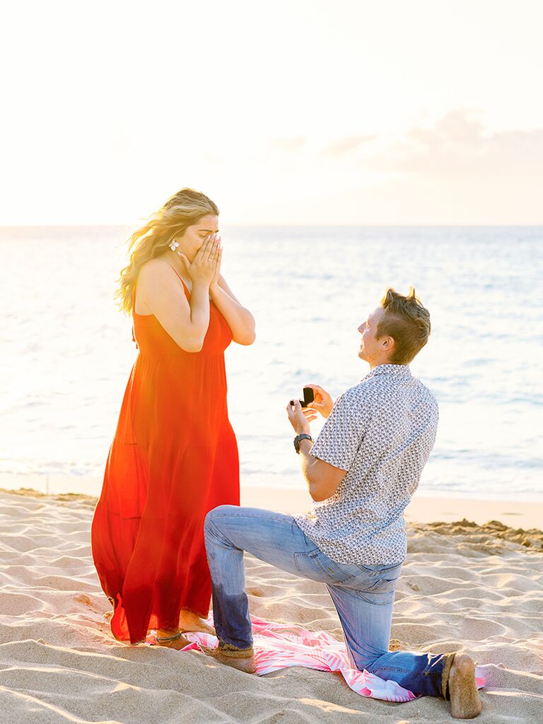 Man proposing on Hawaii beach