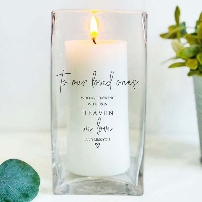 Glass candle holder with writing